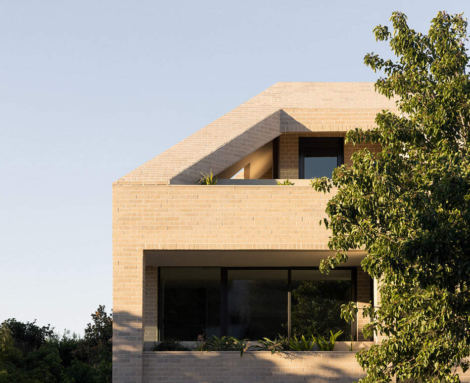 Contemporary nuance and cleverly honed details define Mansard by Carr
