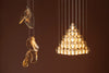 The new Bocci 141 made using a single-action pouring technique, and the expansion of the Bocci 14 pendant now re-imagined in a pyramid configuration. Photo c/o Bocci.

