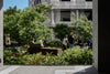 Relaxing in the garden rooftop. Photography © Peter Bennetts c/o Hassell.
