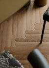 The beautifully textured wooden floors designed by Patricia Urquiola for Listone Giordano add craft and warmth to the interior.
