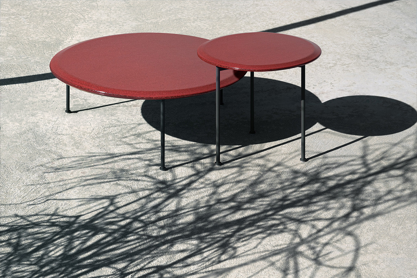 Borea side tables by Piero Lissoni. Photograph © Tommaso Sartori c/o B&B Italia.
